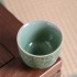 Relief Tangled Branches Lotus Celadon Tea Cup