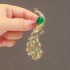 High-end and exquisite emerald green peacock brooch with unique ethnic design